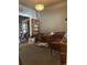 Bright living room with a bookshelf and desk and a comfortable seating area at 36 N Logan St, Denver, CO 80203