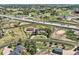 Aerial view of a property, showcasing a well-maintained home, outbuildings, and surrounding landscape at 6646 S Fundy Ct, Centennial, CO 80016