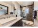 Modern bathroom featuring a glass shower, sleek vanity, and contemporary design at 6646 S Fundy Ct, Centennial, CO 80016