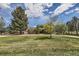 Beautiful home with mature trees and landscaping, spacious front yard and winding driveway at 6646 S Fundy Ct, Centennial, CO 80016