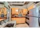 View of the kitchen with stainless steel appliances and wood countertops at 6646 S Fundy Ct, Centennial, CO 80016