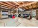 Spacious recreation room with dining booth seating and quirky decor at 6646 S Fundy Ct, Centennial, CO 80016
