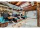 Amusing recreation room area featuring booth seating and garage door at 6646 S Fundy Ct, Centennial, CO 80016