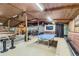 Game room area equipped with stage, ping pong table, and lounge area at 6646 S Fundy Ct, Centennial, CO 80016
