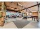 Expansive recreation room featuring a stage, seating area, and ping pong table at 6646 S Fundy Ct, Centennial, CO 80016
