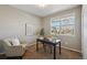 Comfortable home office with neutral walls, carpet, and plenty of natural light at 806 Peony Ct, Brighton, CO 80601