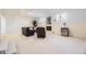 Finished basement offers comfortable seating and a fireplace for relaxation and entertainment at 32 Eagle Dr, Littleton, CO 80123