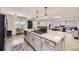 Spacious kitchen featuring an island, modern appliances, and an open layout, perfect for cooking and entertaining at 32 Eagle Dr, Littleton, CO 80123