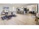 Spacious open-concept kitchen with a large island, modern appliances, and a dining area, ideal for entertaining at 32 Eagle Dr, Littleton, CO 80123