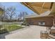 Inviting covered patio with comfortable seating, perfect for outdoor relaxation and entertaining at 32 Eagle Dr, Littleton, CO 80123
