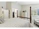 Spacious bedroom boasts neutral carpet, closet access, and plantation shutters at 292 Summerwood Ln, Castle Pines, CO 80108