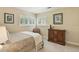 Serene bedroom with shuttered windows, soft lighting, and comfortable furnishings at 292 Summerwood Ln, Castle Pines, CO 80108