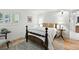 Charming bedroom with hardwood floors, natural light, and cozy decor at 292 Summerwood Ln, Castle Pines, CO 80108