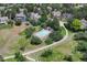 Overhead view of the community pool with lounge chairs and a winding walking path at 292 Summerwood Ln, Castle Pines, CO 80108