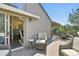 Charming deck featuring multiple seating arrangements, pergola and sliding glass door leading indoors at 292 Summerwood Ln, Castle Pines, CO 80108
