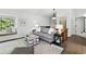Open living room with natural light, neutral colors, and stylish contemporary furniture at 292 Summerwood Ln, Castle Pines, CO 80108