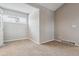 Bright bedroom with neutral wall colors and carpeted floor at 1470 S Quebec Way # 83, Denver, CO 80231