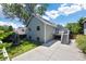 View of the backyard features a well-manicured lawn, swing set, and multi-level deck at 4786 S Yampa St, Aurora, CO 80015