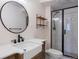 Modern bathroom with a large walk-in shower, updated vanity, and stylish fixtures at 4786 S Yampa St, Aurora, CO 80015