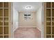 Bedroom featuring carpet, a window, baseboard heating, and neutral walls at 4786 S Yampa St, Aurora, CO 80015
