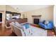Inviting living room with hardwood floors, fireplace, and comfortable seating area at 4786 S Yampa St, Aurora, CO 80015