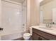 Clean bathroom with a tub, shower, and vanity at 804 W 128Th Pl, Westminster, CO 80234