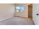 Spacious bedroom with a window and access to a closet at 804 W 128Th Pl, Westminster, CO 80234