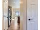 View of kitchen and living area from hallway at 804 W 128Th Pl, Westminster, CO 80234