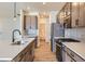 Modern kitchen with stainless steel appliances and an island at 804 W 128Th Pl, Westminster, CO 80234