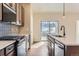 Bright kitchen with sliding glass doors leading to a patio at 804 W 128Th Pl, Westminster, CO 80234