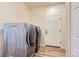 Laundry room with washer, dryer, and storage at 804 W 128Th Pl, Westminster, CO 80234