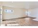 Spacious living room with hardwood floors and large windows at 804 W 128Th Pl, Westminster, CO 80234