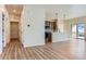 Open concept living room with hardwood floors and neutral walls at 804 W 128Th Pl, Westminster, CO 80234