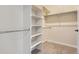 Spacious walk-in closet with shelves and rods at 804 W 128Th Pl, Westminster, CO 80234