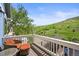 Balcony with comfortable seating, offering serene views of the surrounding landscape and natural beauty at 188 S Rogers Way, Golden, CO 80401