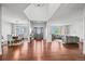 An open and bright foyer featuring wood floors and views of the dining and living areas at 188 S Rogers Way, Golden, CO 80401