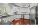 A bright kitchen features granite countertops, stainless steel appliances, and lots of cabinetry at 188 S Rogers Way, Golden, CO 80401
