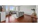 Inviting living room showcasing hardwood floors, a comfortable sectional sofa, and ample natural light at 188 S Rogers Way, Golden, CO 80401