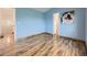 Inviting blue bedroom with wood flooring, creating a relaxing atmosphere at 12265 E 2Nd Dr, Aurora, CO 80011