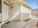 Front entryway of a home with a white door and siding at 12265 E 2Nd Dr, Aurora, CO 80011