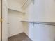 Walk-in closet featuring ample shelving and storage space at 12265 E 2Nd Dr, Aurora, CO 80011