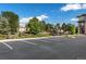 Designated parking lot with ample spaces for residents at 155 S Monaco Pkwy # 114, Denver, CO 80224