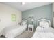 Charming bedroom with two twin beds and bright, decorative accents at 4621 S Perry Way, Denver, CO 80236