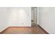 Clean basement with tile flooring, trim, and entry to an adjoining room at 3580 Locust St, Denver, CO 80207