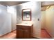 Finished basement bathroom featuring tiled floors, modern vanity, and new fixtures at 3580 Locust St, Denver, CO 80207