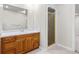 Bathroom boasts a marble countertop vanity and glass shower at 3810 Urban St, Wheat Ridge, CO 80033