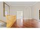 Spacious hallway features hardwood flooring, and archway details at 3810 Urban St, Wheat Ridge, CO 80033