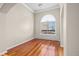 Office with hardwood floors, large window, and neutral walls at 3810 Urban St, Wheat Ridge, CO 80033