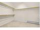 Large walk-in closet with double hanging rods and shelving at 3810 Urban St, Wheat Ridge, CO 80033