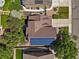 Aerial view of the house showcasing the roof and driveway at 13445 Kearney St, Thornton, CO 80602